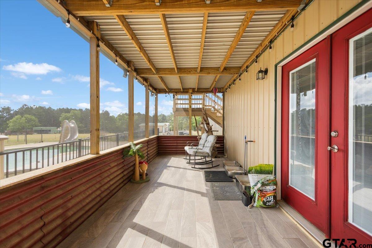 15515 County Road 434 Lindale, TX 75771 - Photo 38 of 46 a view of balcony with couch and wooden floor