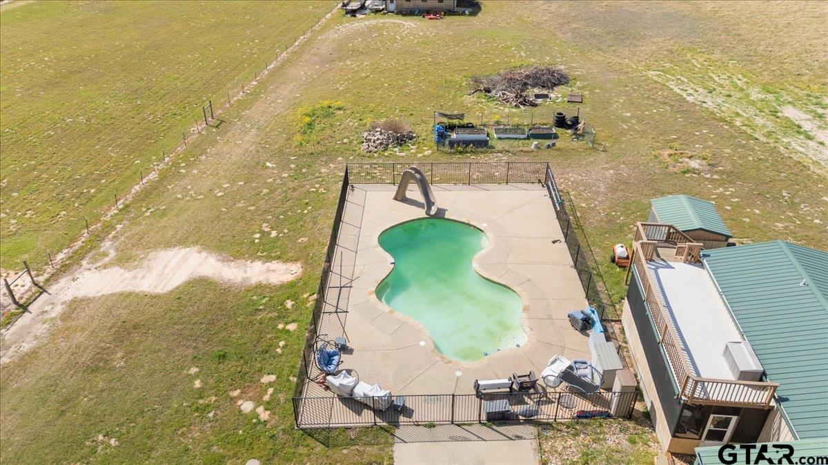 15515 County Road 434 Lindale, TX 75771 - Photo 4 of 46 a view of a swimming pool with an ocean view