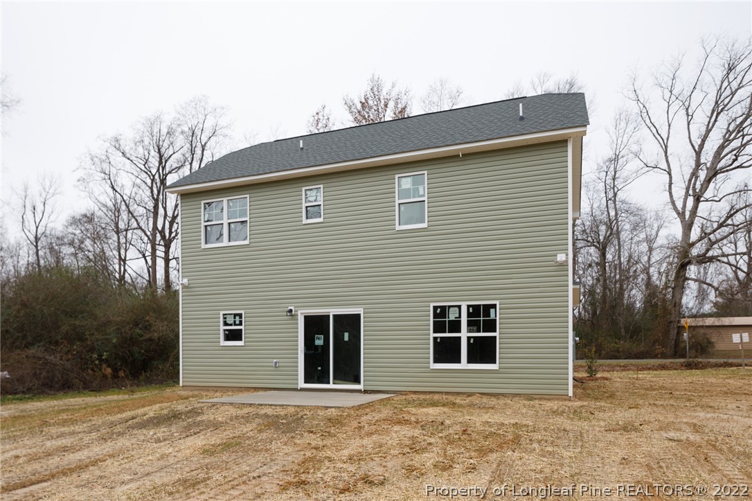 5512 Tolarsville Road St. Pauls, NC 28384 - Photo 5 of 5 a front view of a house with a yard