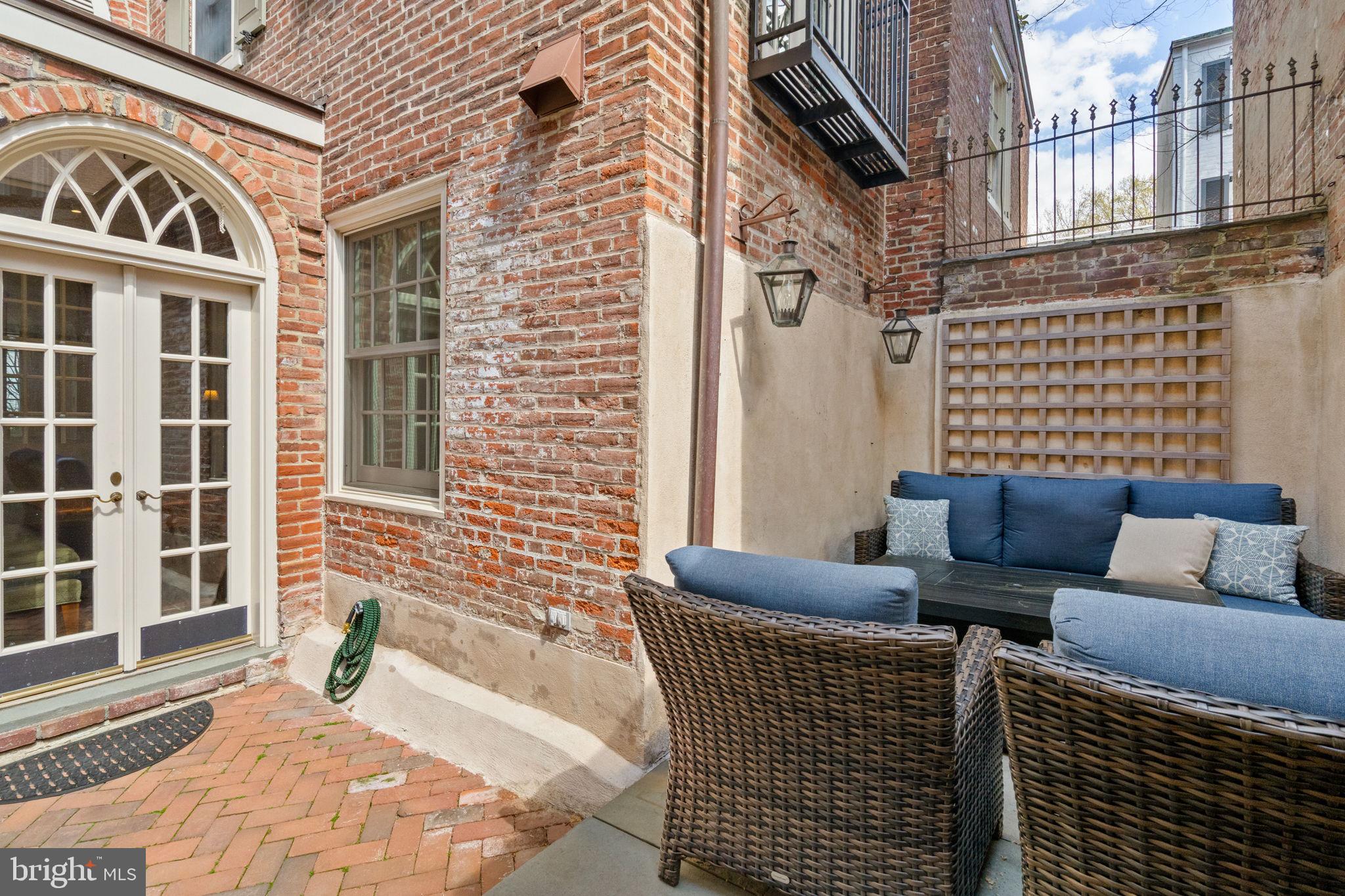 228 Spruce Street Philadelphia, PA 19106 - Photo 16 of 36 a view of a brick building with many windows