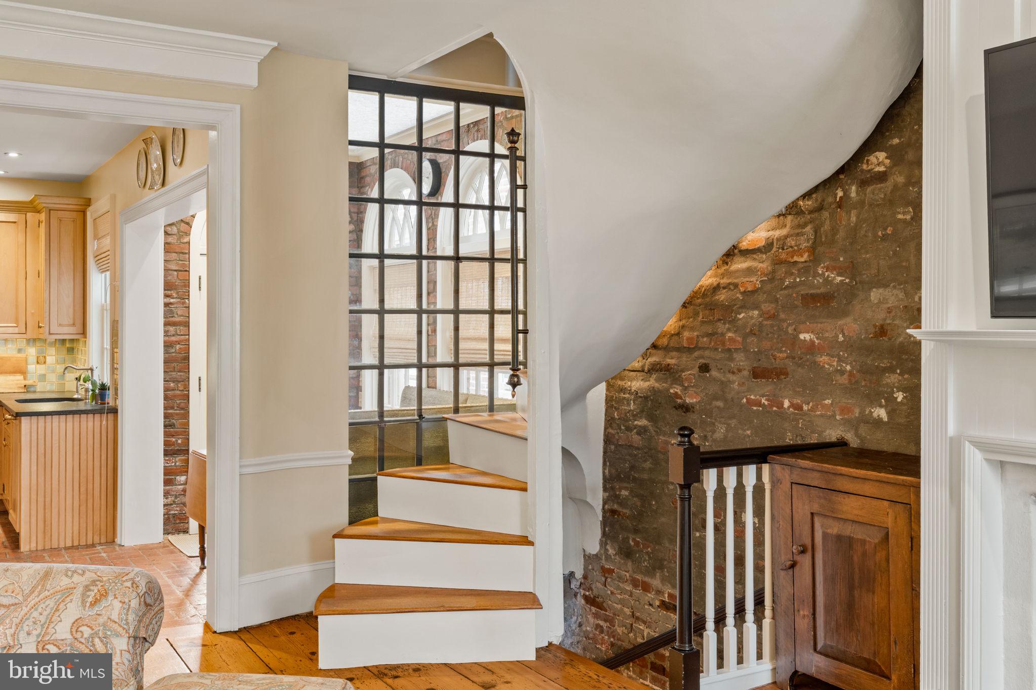 228 Spruce Street Philadelphia, PA 19106 - Photo 19 of 36 a front view of a house with wooden floor and windows