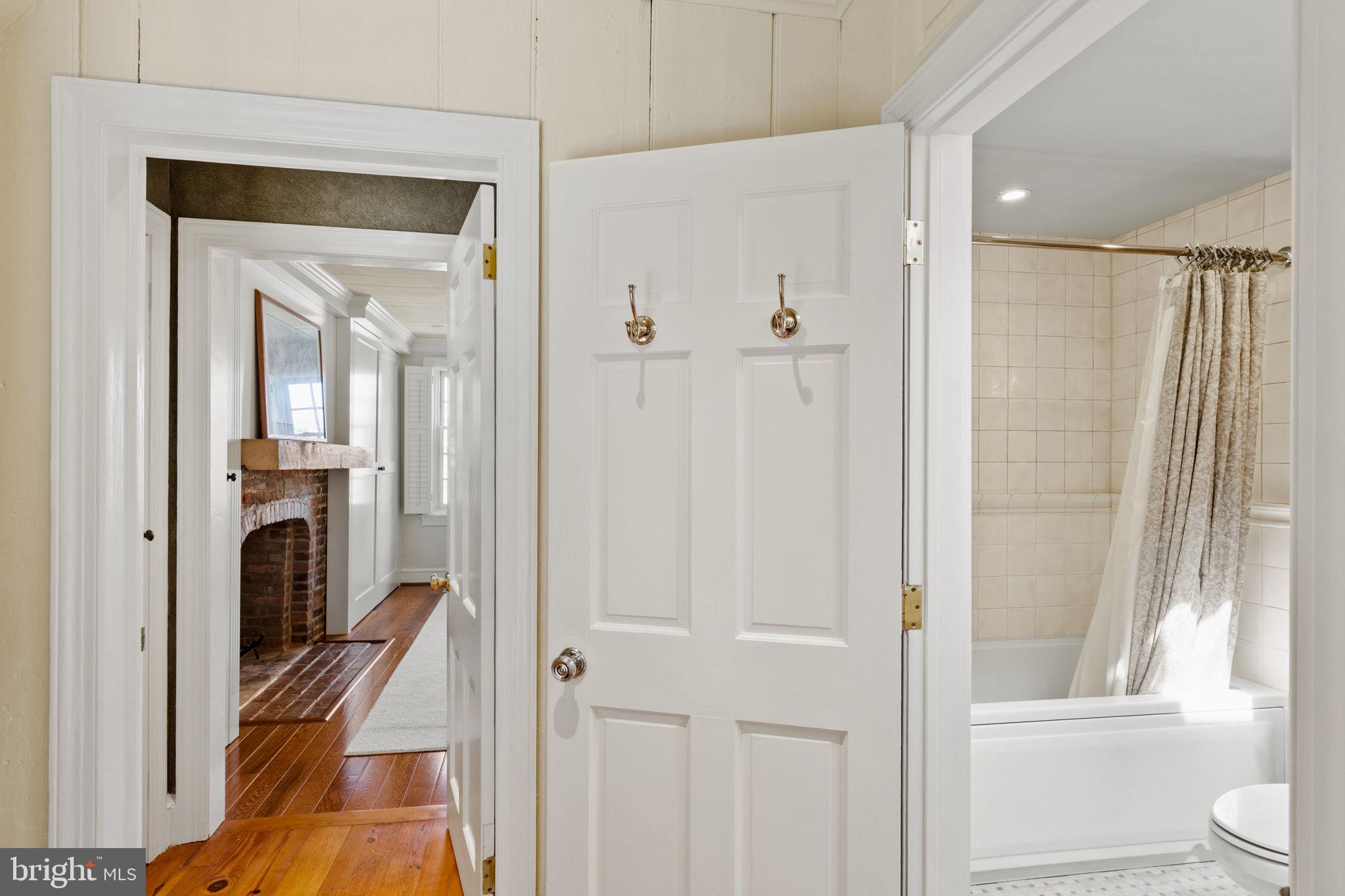 228 Spruce Street Philadelphia, PA 19106 - Photo 23 of 36 a view of a bathroom from a hallway