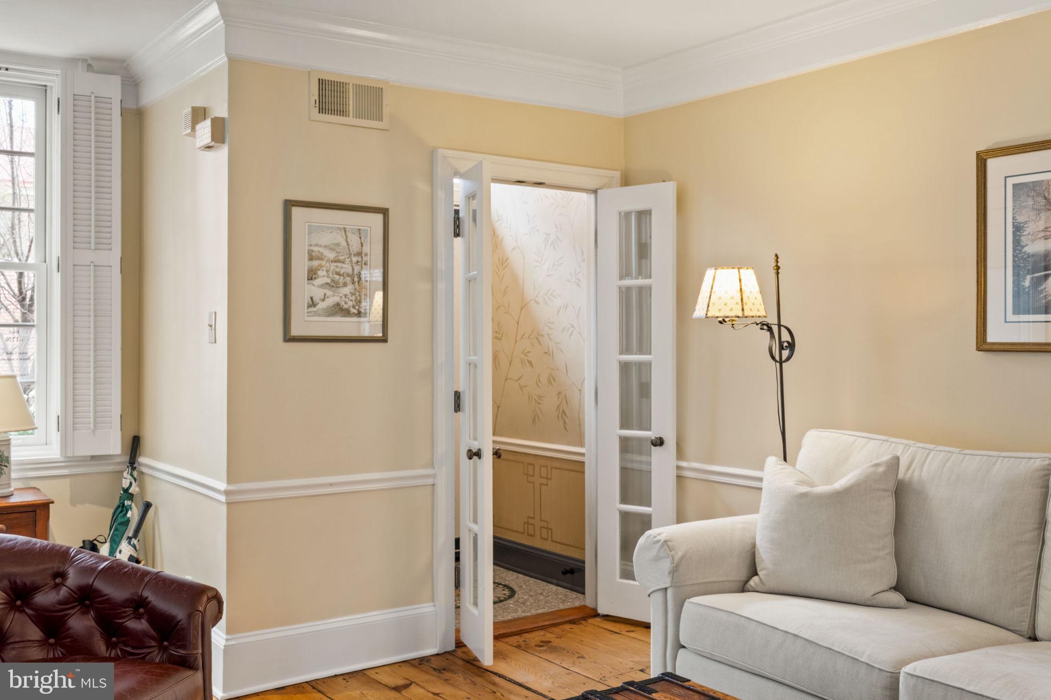 228 Spruce Street Philadelphia, PA 19106 - Photo 5 of 36 a living room with furniture and a large window