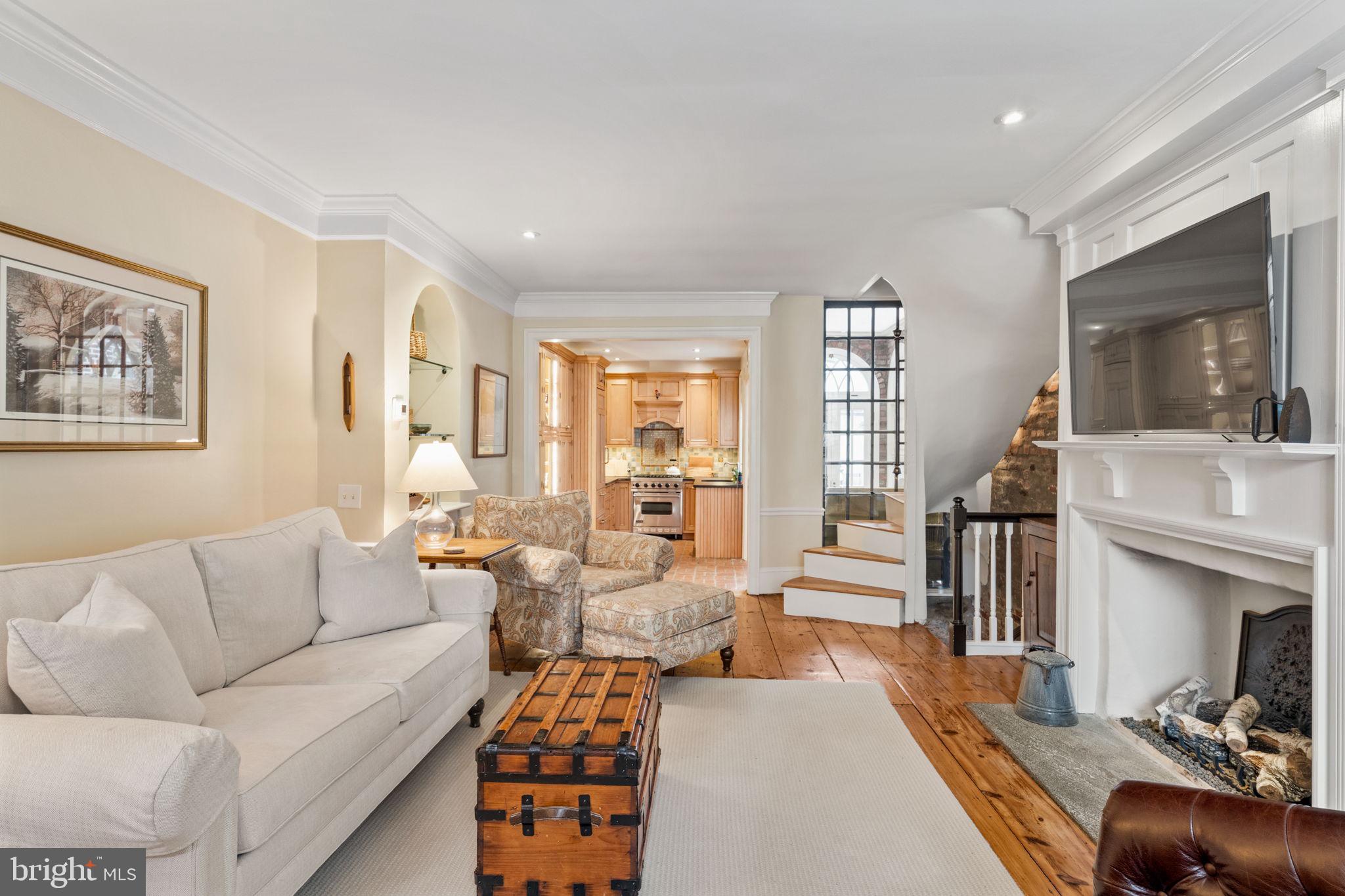 228 Spruce Street Philadelphia, PA 19106 - Photo 7 of 36 a living room with furniture fireplace and flat screen tv