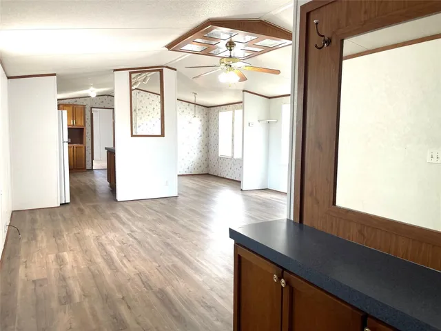 a view of livingroom with furniture and wooden floor
