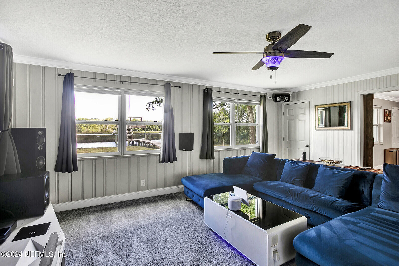 2907 Ribault Scenic Drive Jacksonville, FL 32208 - Photo 13 of 49 a living room with furniture and a large window