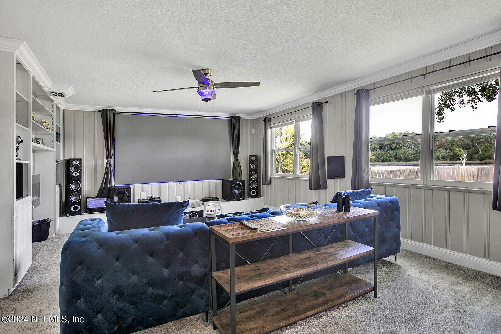 2907 Ribault Scenic Drive Jacksonville, FL 32208 - Photo 14 of 49 a living room with furniture and a flat screen tv