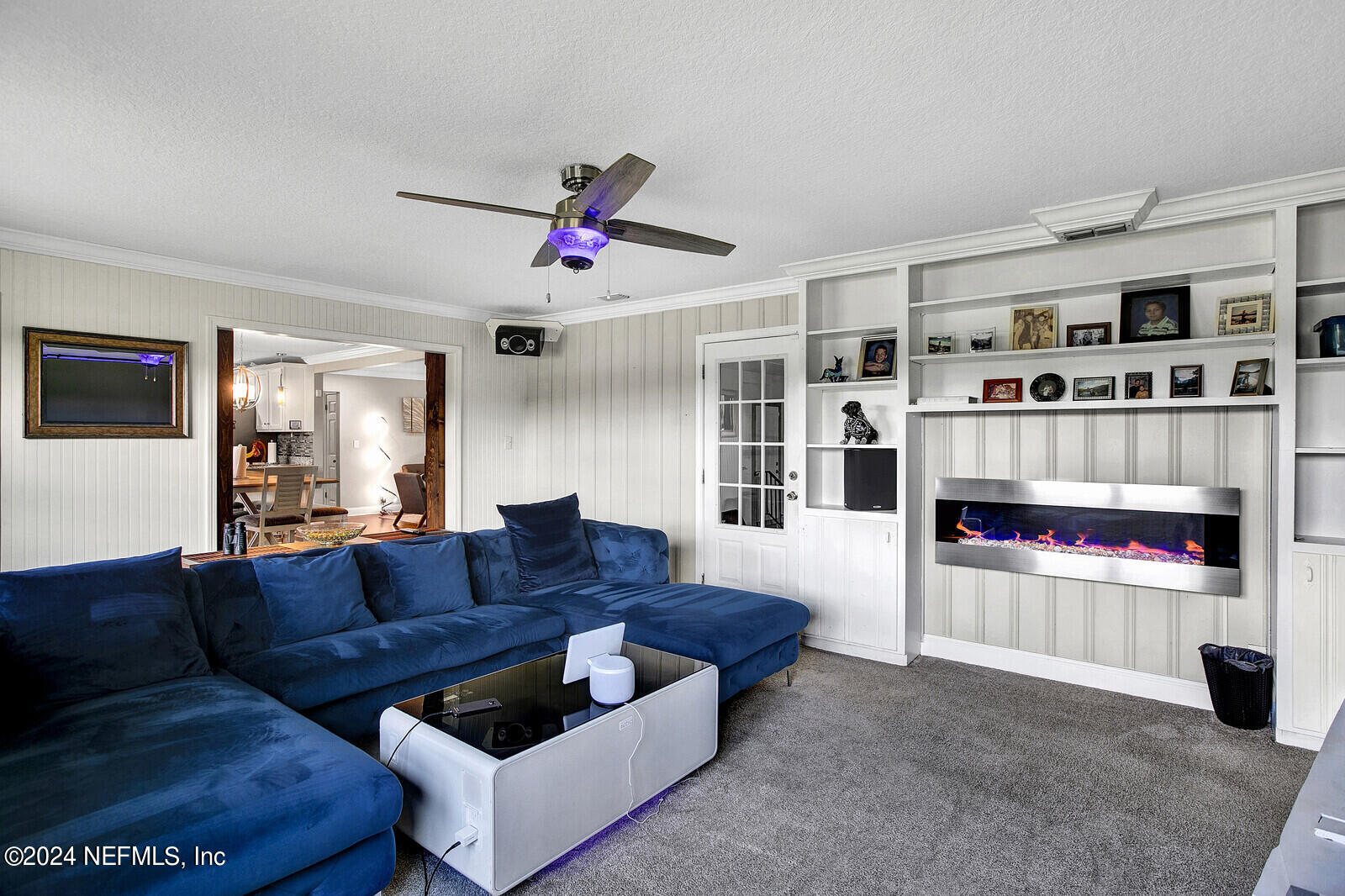 2907 Ribault Scenic Drive Jacksonville, FL 32208 - Photo 16 of 49 a living room with furniture and flat screen tv