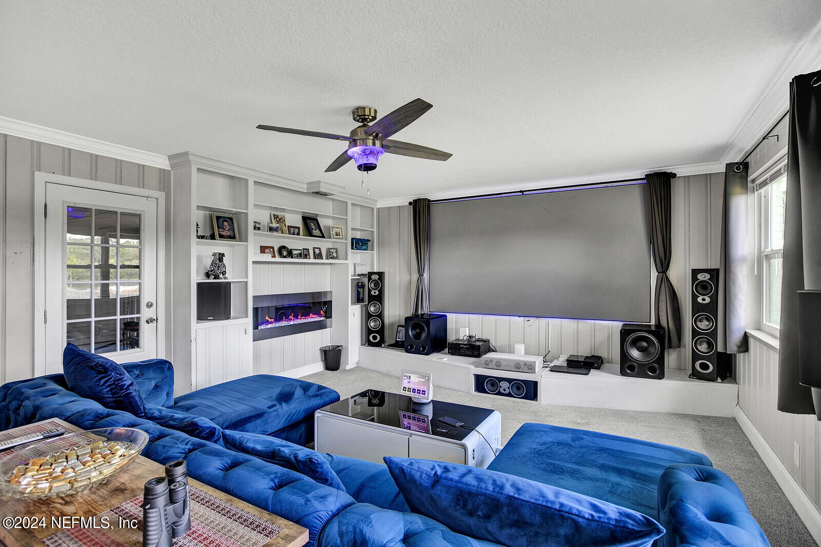 2907 Ribault Scenic Drive Jacksonville, FL 32208 - Photo 17 of 49 a living room with furniture and a flat screen tv