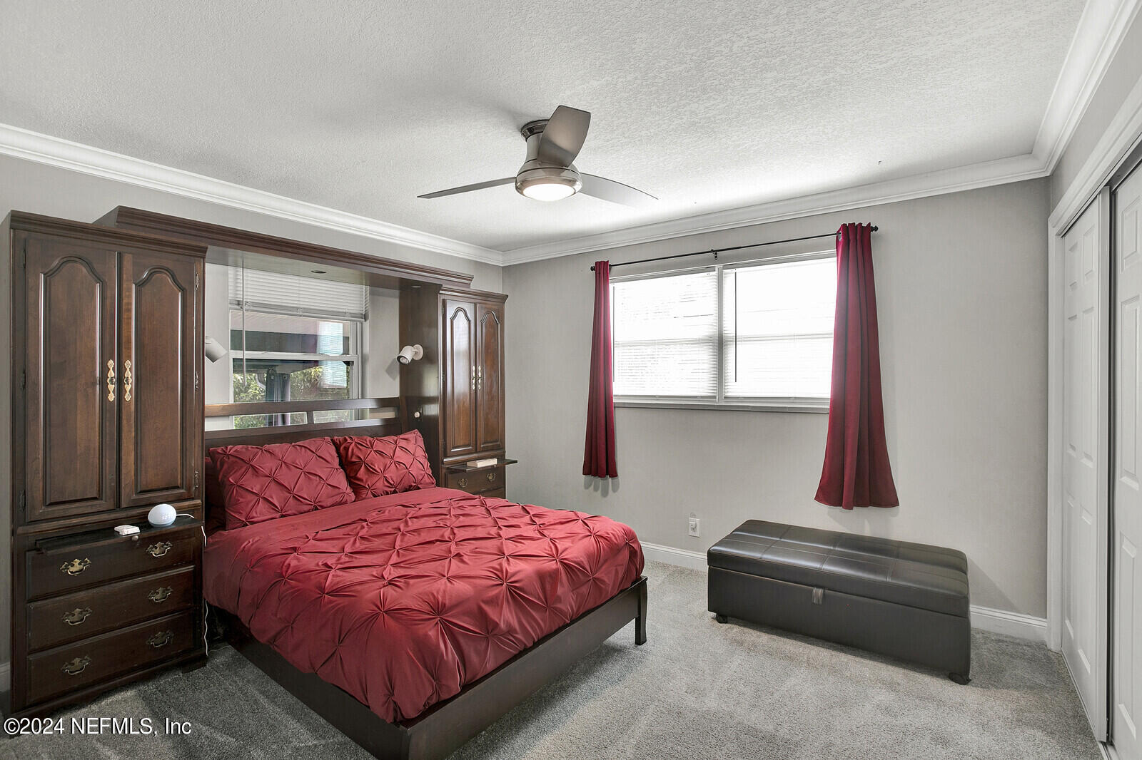 2907 Ribault Scenic Drive Jacksonville, FL 32208 - Photo 24 of 49 a bedroom with a large bed and a window