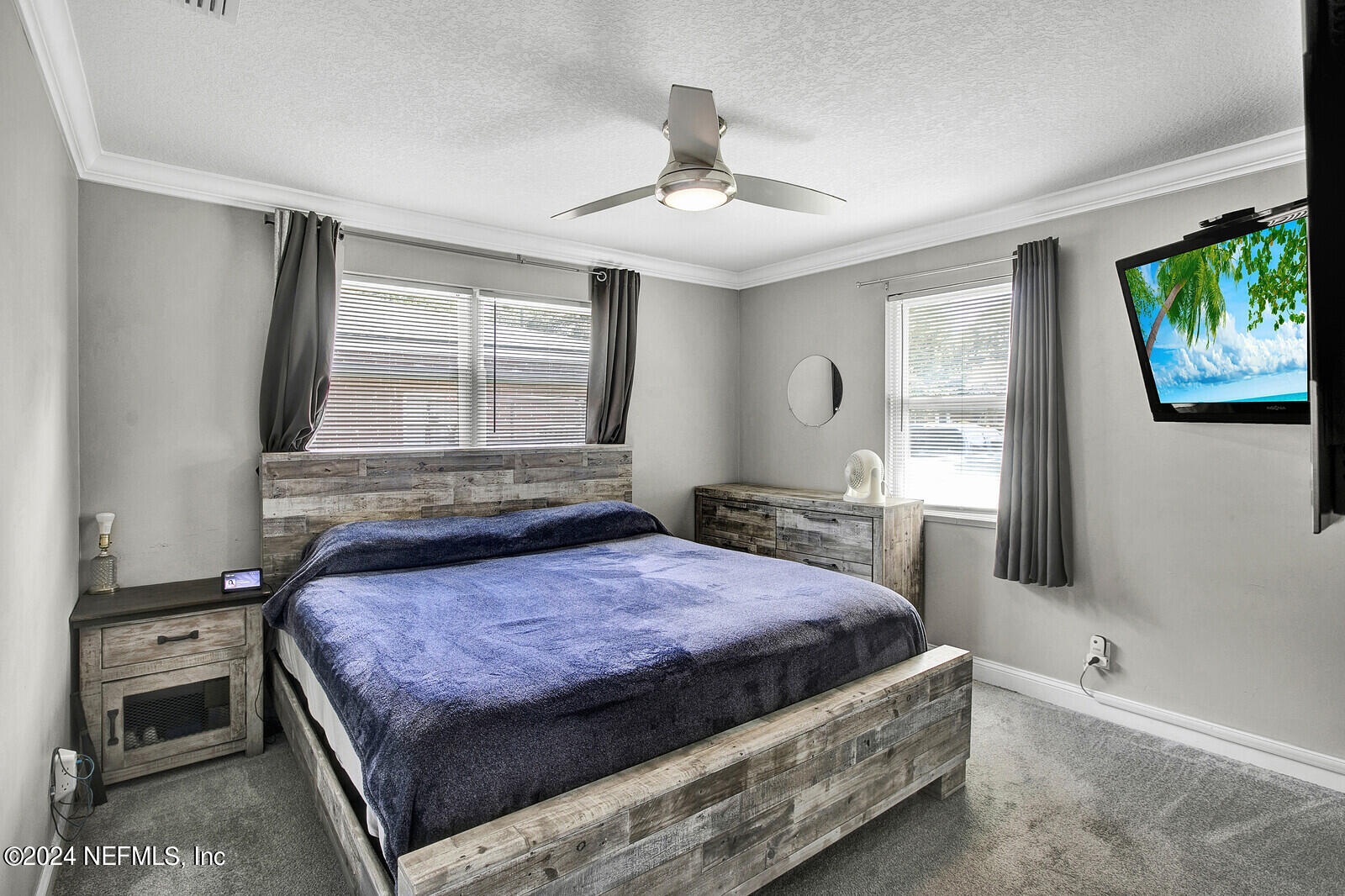 2907 Ribault Scenic Drive Jacksonville, FL 32208 - Photo 26 of 49 a bedroom with a bed and a window