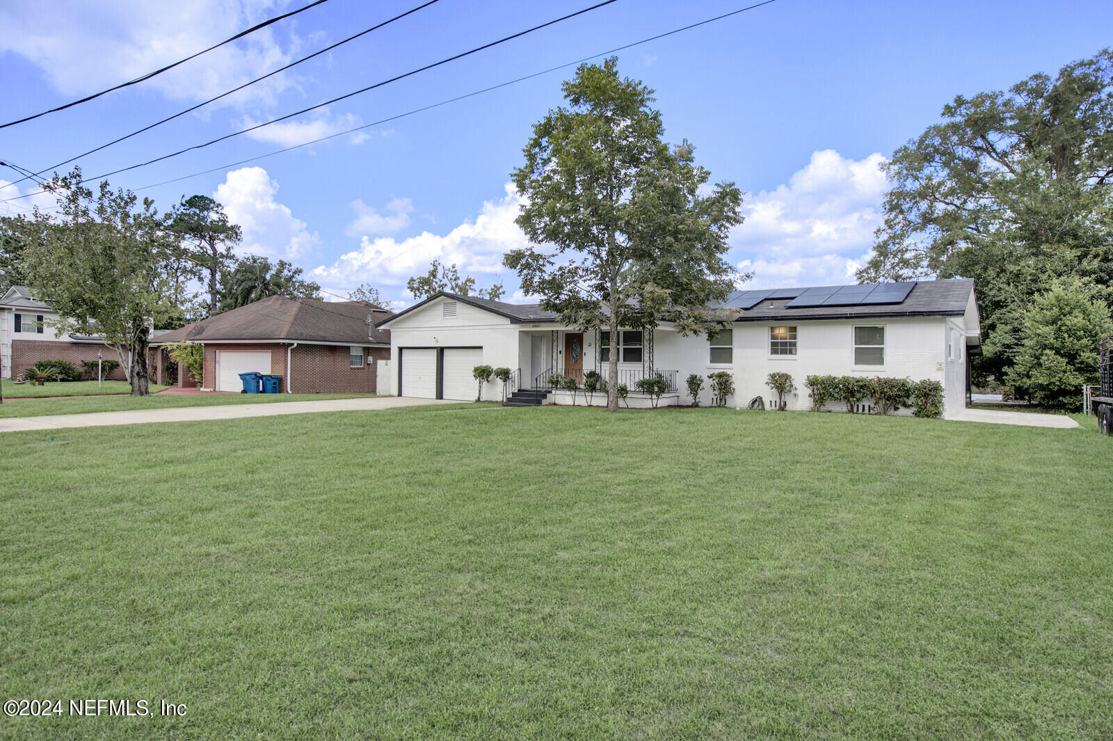 2907 Ribault Scenic Drive Jacksonville, FL 32208 - Photo 3 of 49 a front view of house with a garden