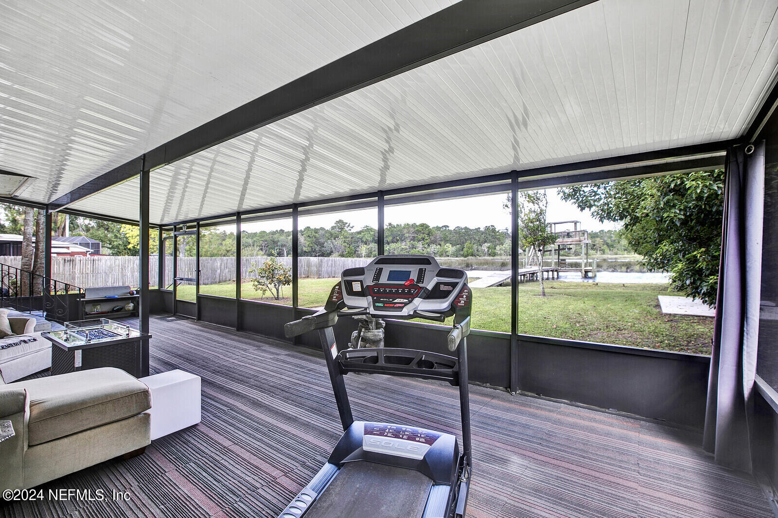 2907 Ribault Scenic Drive Jacksonville, FL 32208 - Photo 31 of 49 a living room with large windows