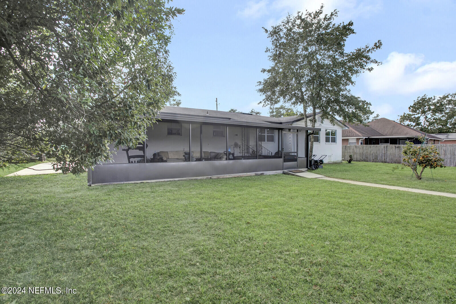 2907 Ribault Scenic Drive Jacksonville, FL 32208 - Photo 33 of 49 a view of a house with a yard and sitting area