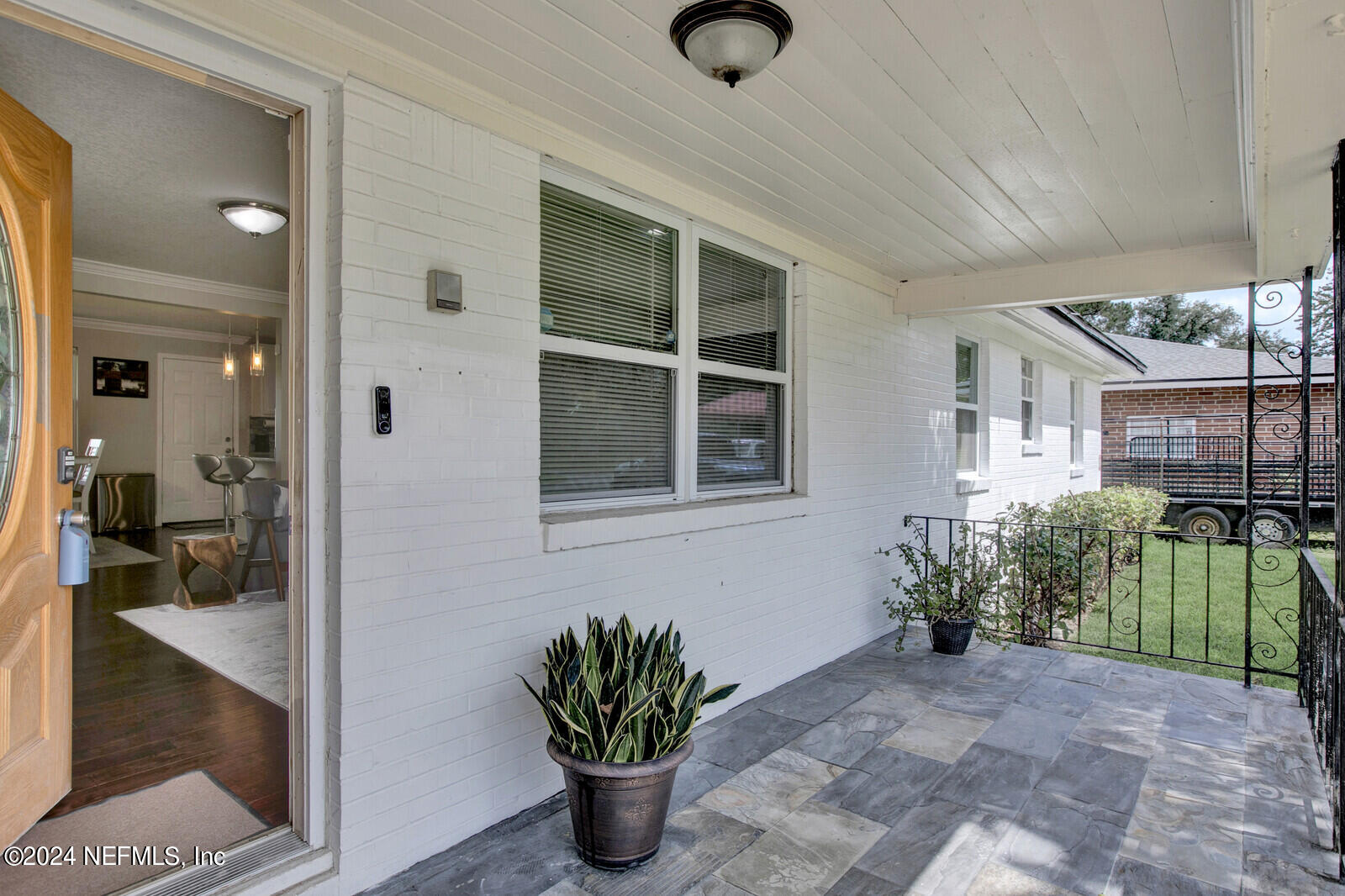 2907 Ribault Scenic Drive Jacksonville, FL 32208 - Photo 4 of 49 a view of a entryway door of the house