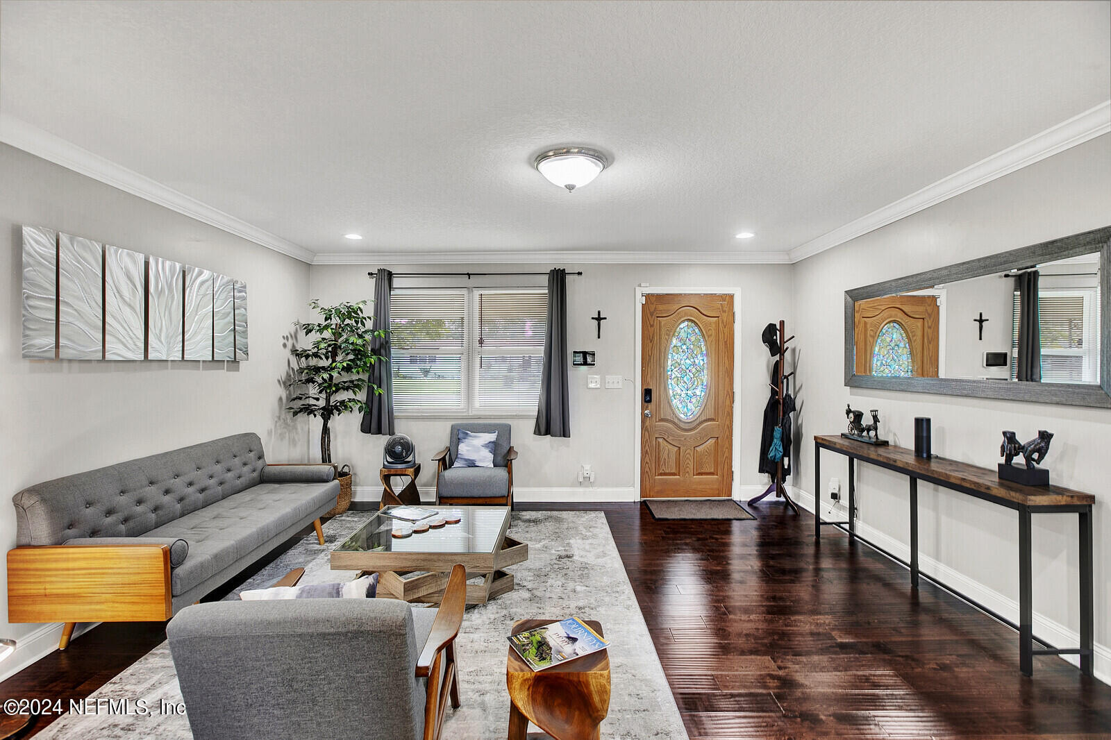 2907 Ribault Scenic Drive Jacksonville, FL 32208 - Photo 6 of 49 a living room with furniture and wooden floor