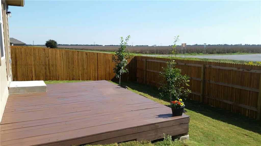 185 Voss Kyle, TX 78640 - Photo 25 of 26 a wooden deck with lake view