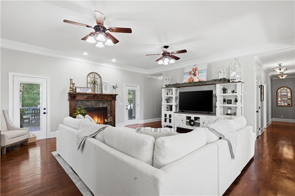 310 Gaines Road Southeast Dalton, GA 30721 - Photo 7 of 53 a living room with furniture and a flat screen tv