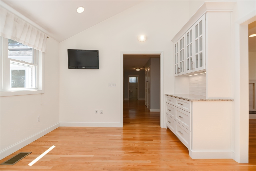 2054 Main Street Concord, MA 01742 - Photo 11 of 41 a view of an empty room with window and wooden floor
