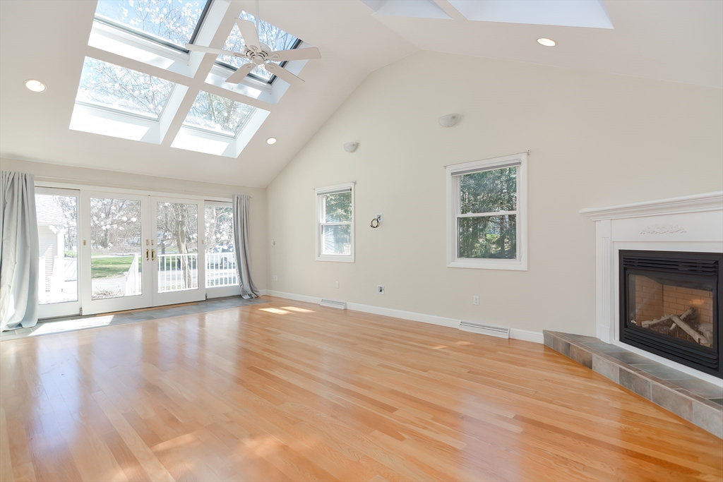 2054 Main Street Concord, MA 01742 - Photo 27 of 41 a view of an empty room with a window and wooden floor