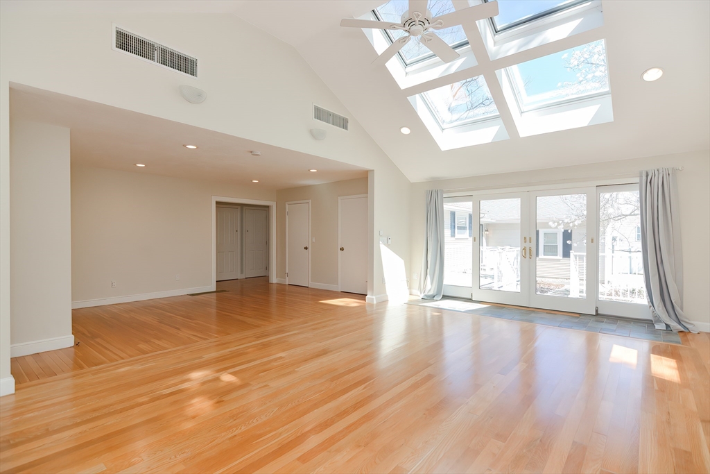 2054 Main Street Concord, MA 01742 - Photo 28 of 41 a view of an empty room with wooden floor and a window