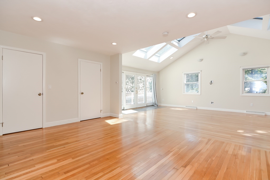 2054 Main Street Concord, MA 01742 - Photo 29 of 41 a view of an empty room with wooden floor and a window