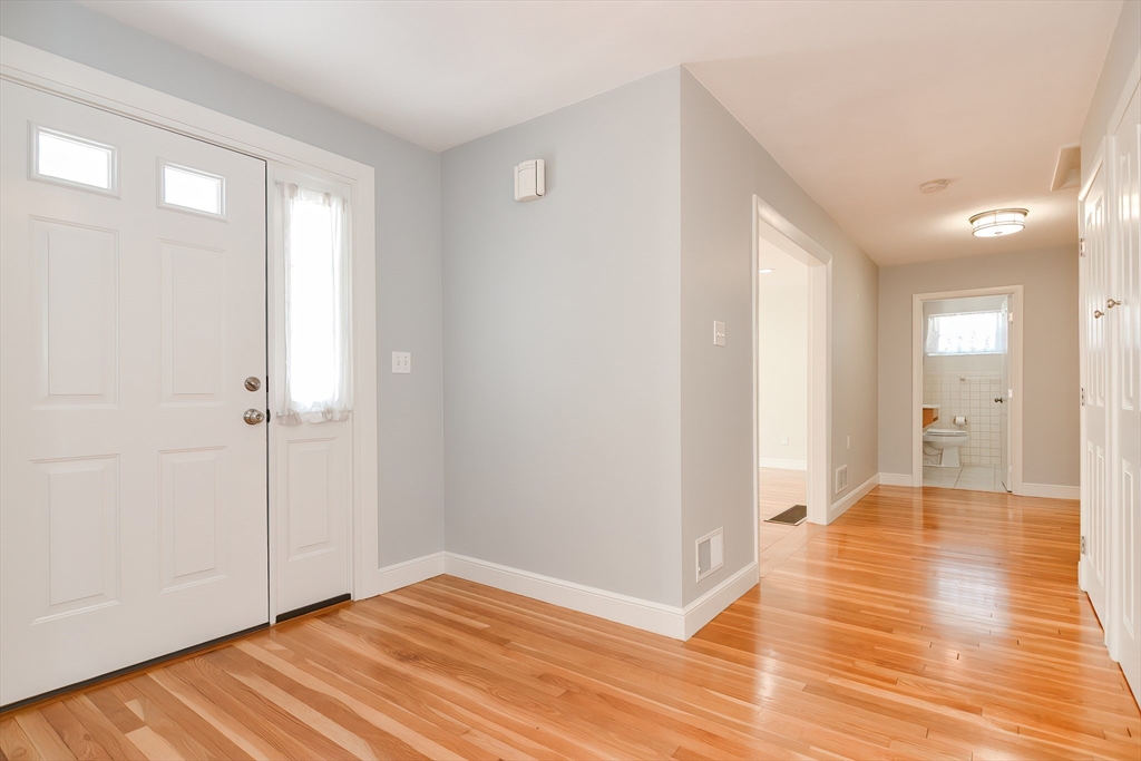 2054 Main Street Concord, MA 01742 - Photo 32 of 41 a view of a room with wooden floor