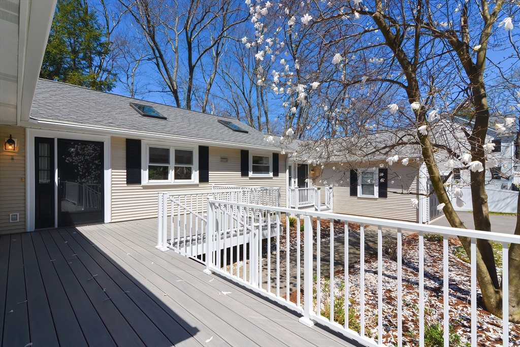2054 Main Street Concord, MA 01742 - Photo 4 of 41 a view of a house with wooden deck