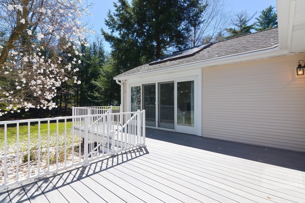 2054 Main Street Concord, MA 01742 - Photo 6 of 41 a view of a deck with two chair and table