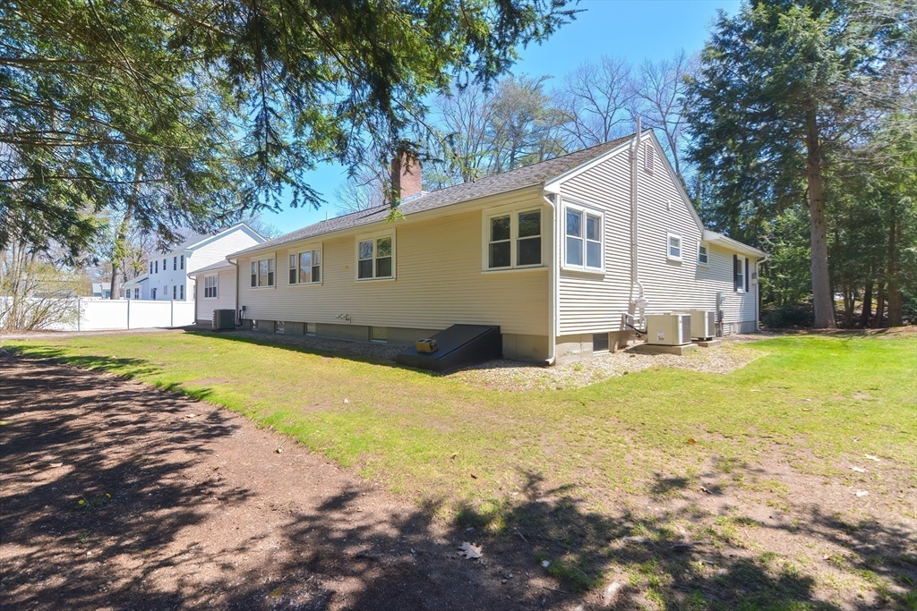 2054 Main Street Concord, MA 01742 - Photo 7 of 41 a view of a yard with swimming pool