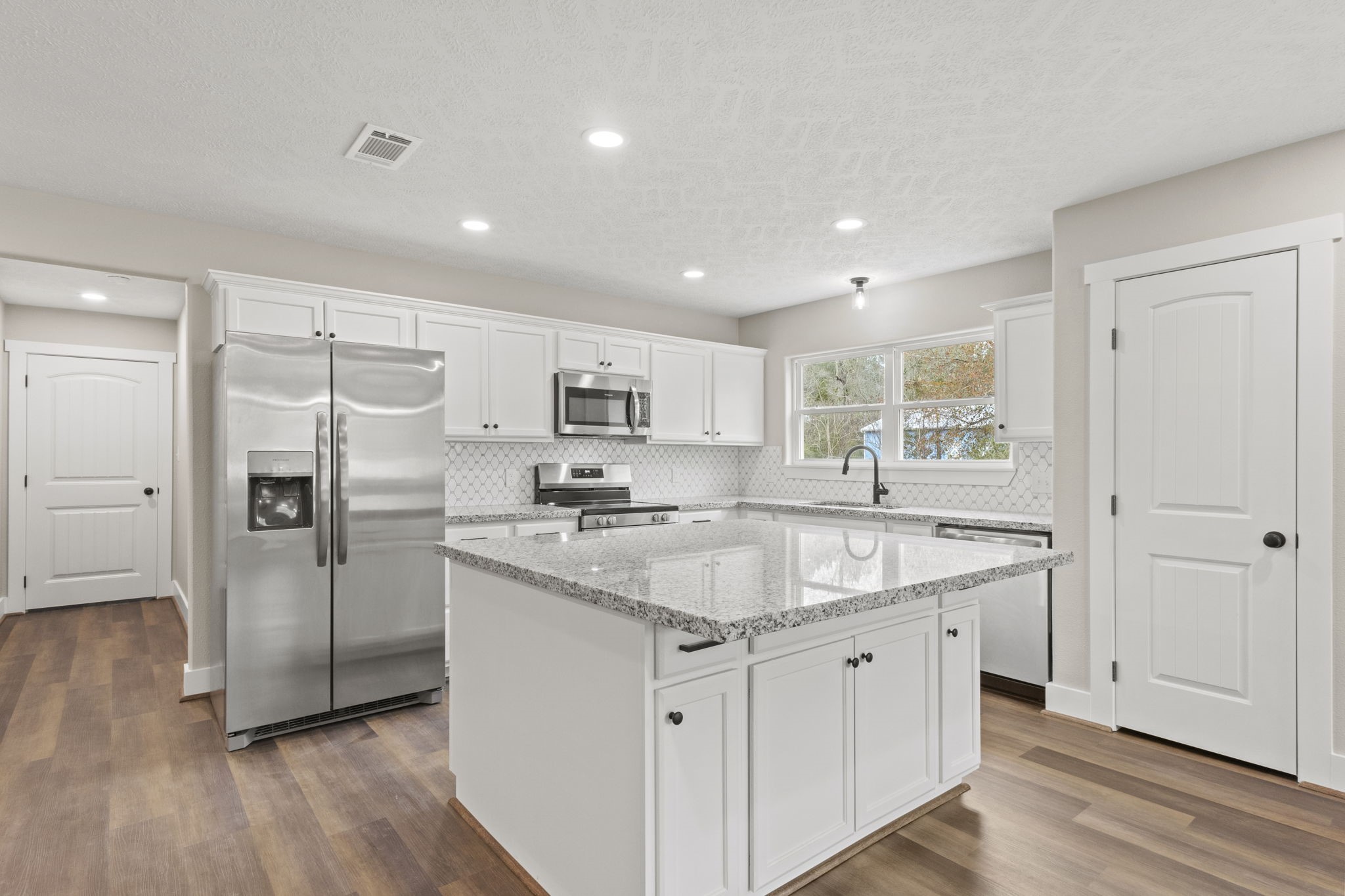 2357 Neyland Road Silsbee, TX 77656 - Photo 11 of 38 Kitchen with large island and new appliances!