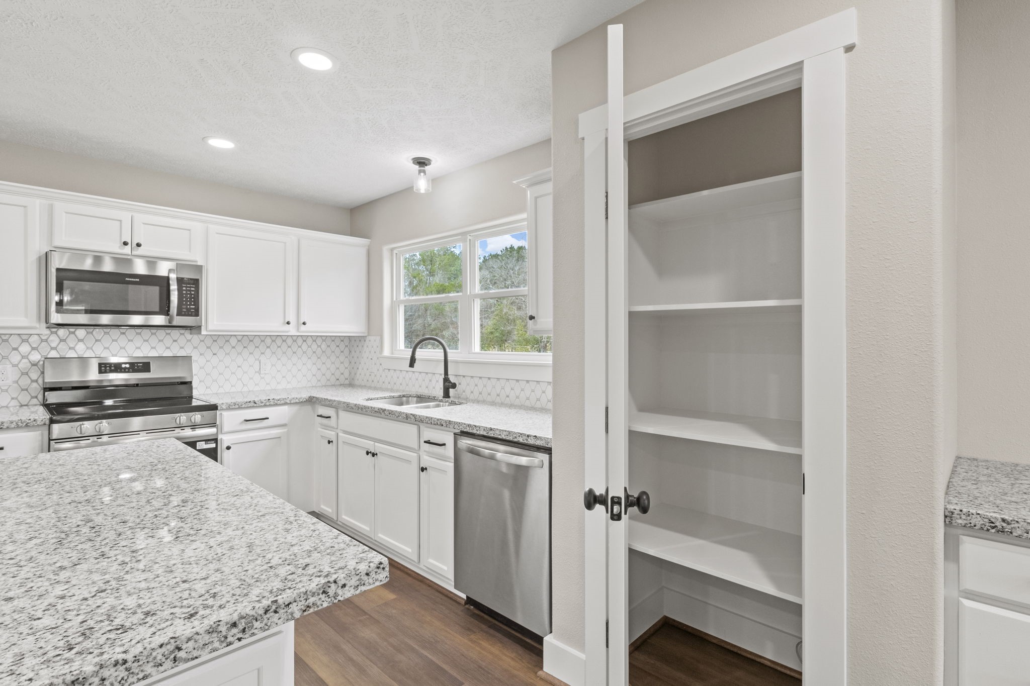 2357 Neyland Road Silsbee, TX 77656 - Photo 14 of 38 Kitchen Pantry