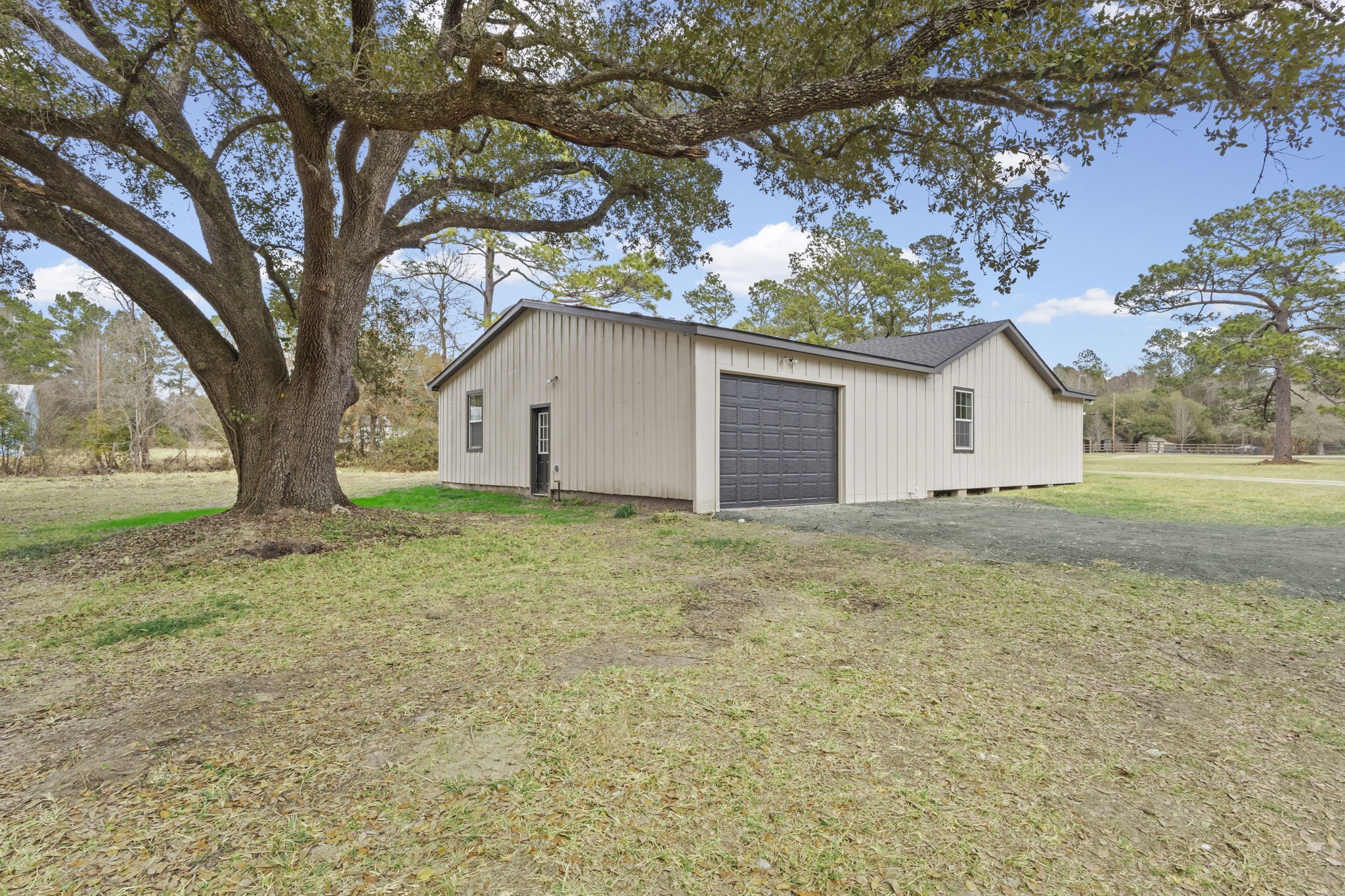 2357 Neyland Road Silsbee, TX 77656 - Photo 32 of 38 Back Yard with large Oak tree
