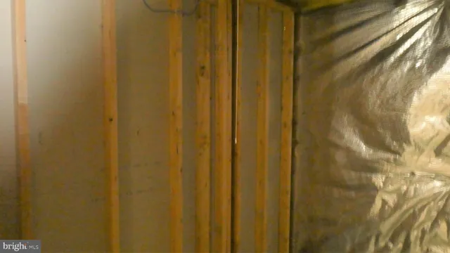 a kitchen with granite countertop a sink and cabinets