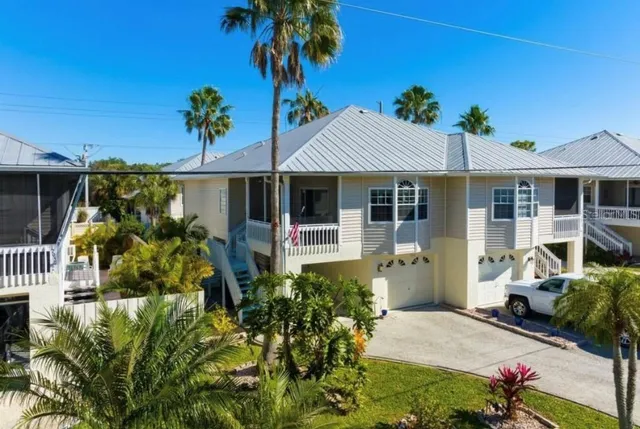 a front view of a house with a porch