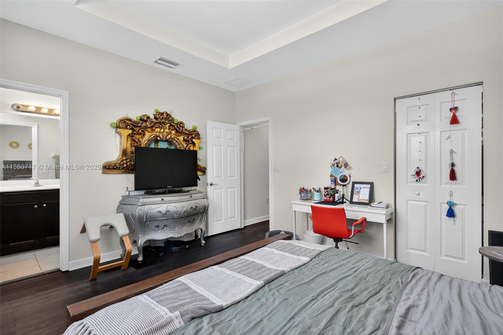 11418 Southwest 250th Street Homestead, FL 33032 - Photo 18 of 60 a living room with furniture and a flat screen tv
