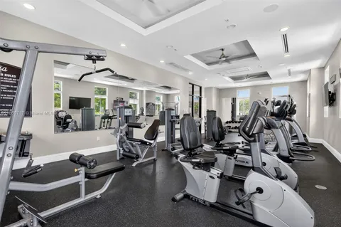 a outdoor space with a table tennis table and chairs