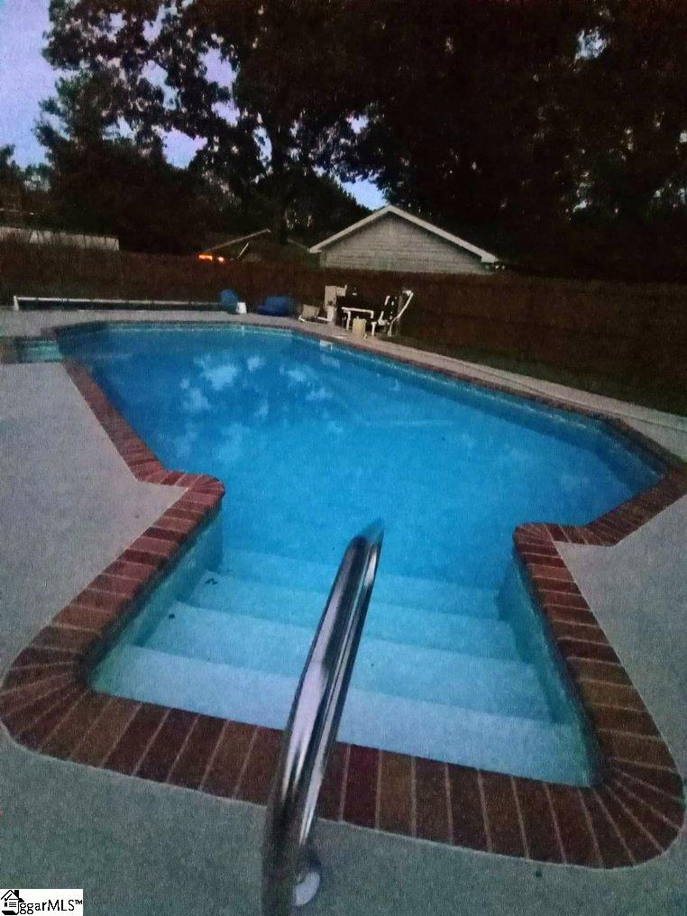 304 Mitchell Road Greenville, SC 29615 - Photo 26 of 36 Photo from seller of when pool was open. Comes with sturdy cover.