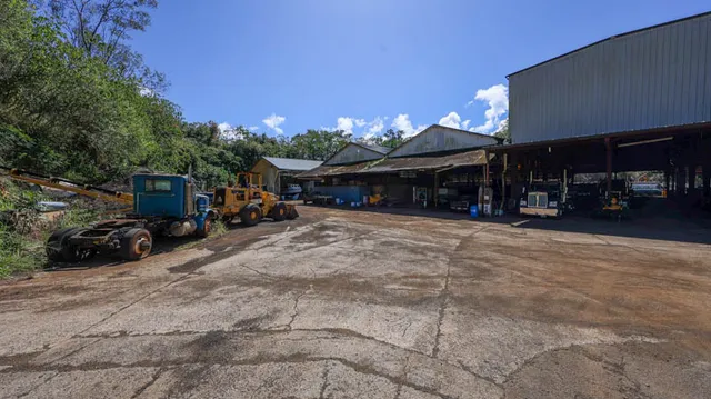a view of street with parked cars