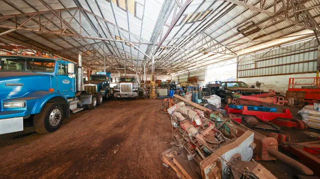 a view of a street with cars
