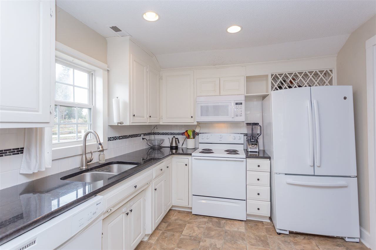 5126 Leesville Road Durham, NC 27703 - Photo 9 of 20 Granite counters really shine in this room. Kitchen