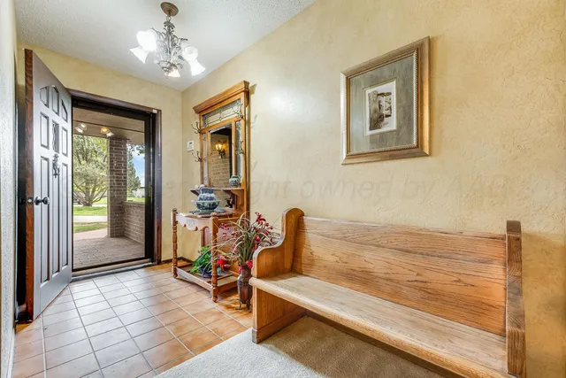 a view of livingroom with workspace