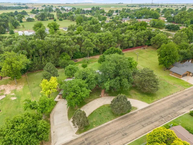 a view of a garden from a balcony