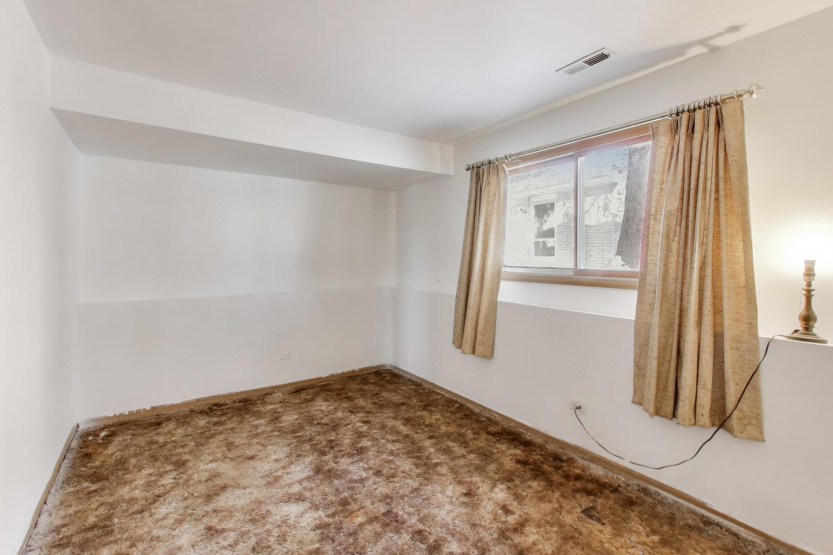 749 Old Farm Road Matteson, IL 60443 - Photo 16 of 34 a view of empty room with wooden floor and fan