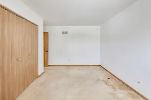 a view of a room with a hallway