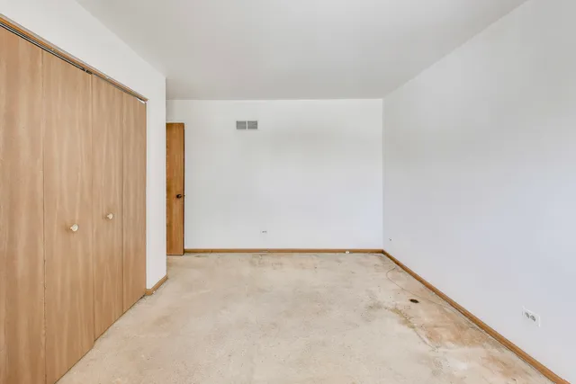 a view of a room with a hallway