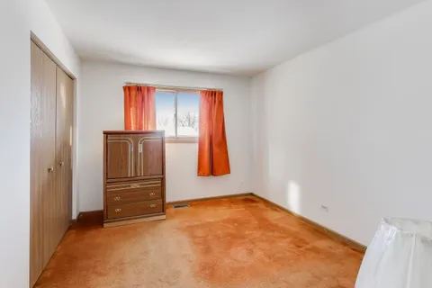 an empty room with closet