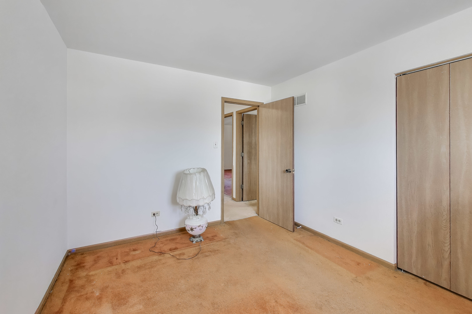 749 Old Farm Road Matteson, IL 60443 - Photo 27 of 34 a bedroom with a bed and cabinets