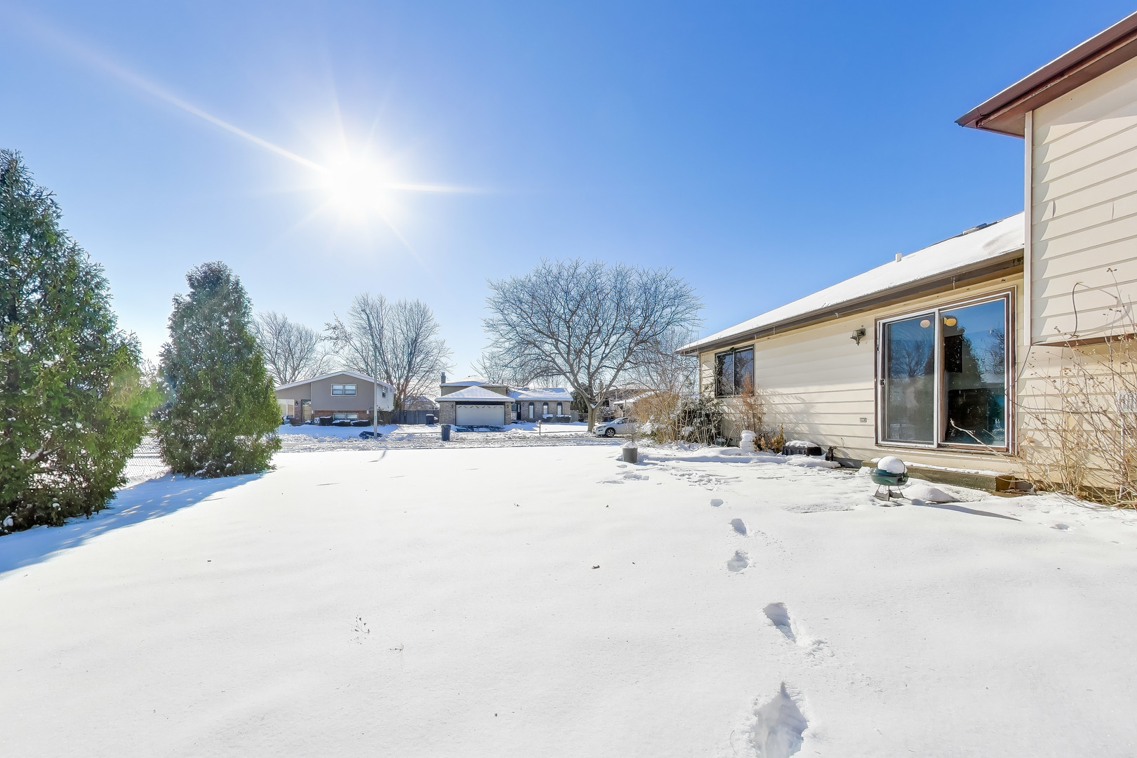 749 Old Farm Road Matteson, IL 60443 - Photo 31 of 34 a view of a house with snow on the road