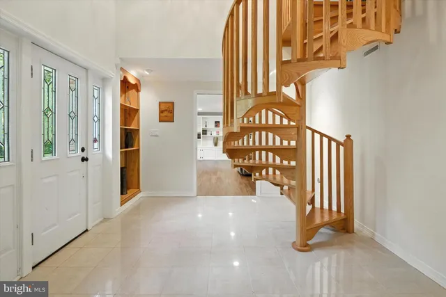 a view of an entryway with a door